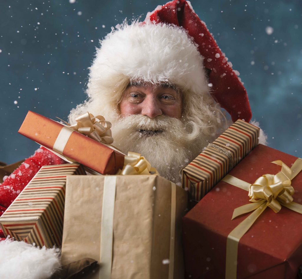 Close up of Santa carrying presents